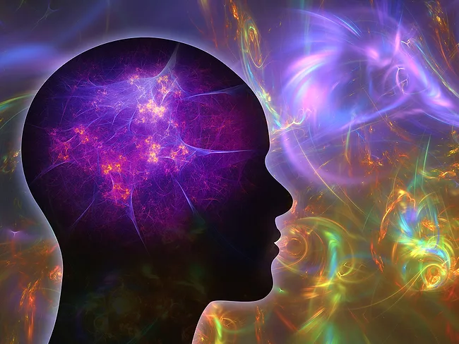 Silhouette of head and brainwith fractal art