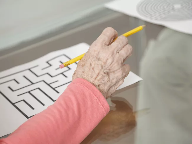 Person attempting a brain teaser