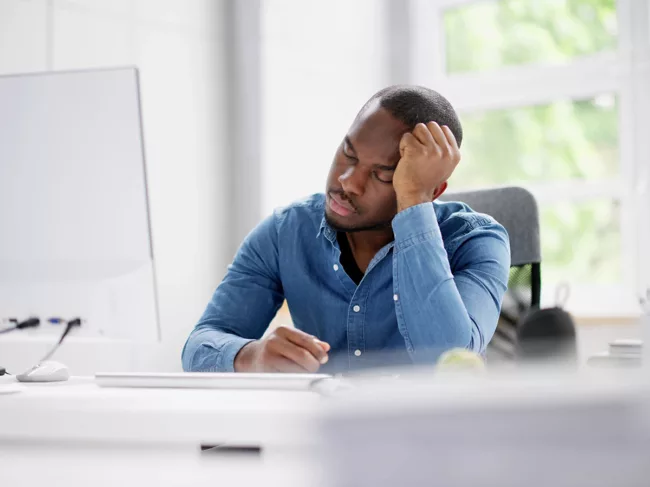 Man asleep at desk