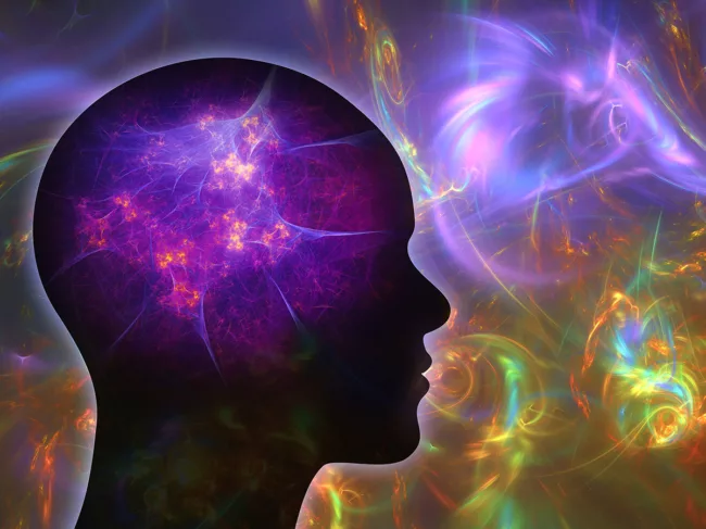 Silhouette of head and brainwith fractal art