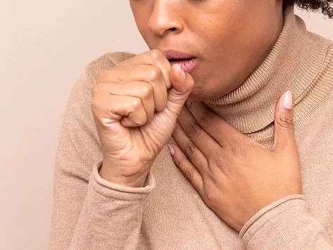 Woman coughing