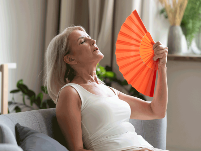 Woman with orange fan