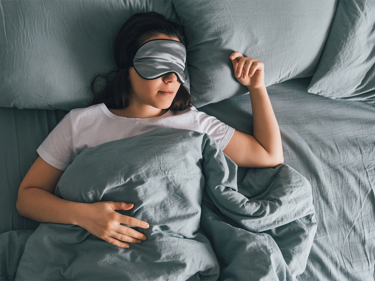 Woman wearing eye mask while sleeping